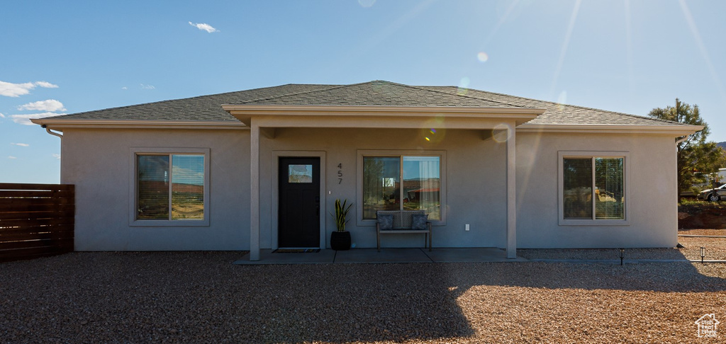 Rear view of property featuring a patio