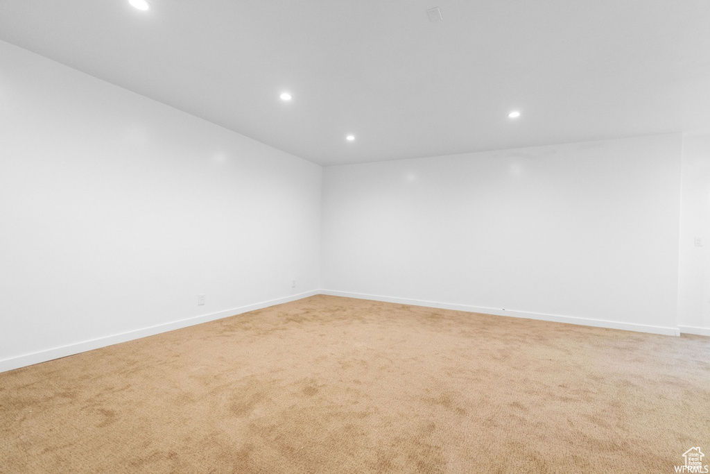 Spare room featuring carpet floors