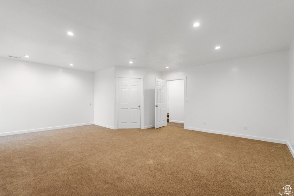 View of carpeted spare room