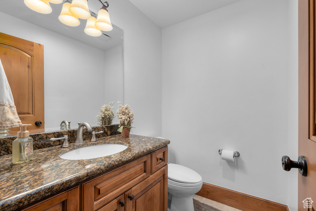 Bathroom featuring toilet and vanity