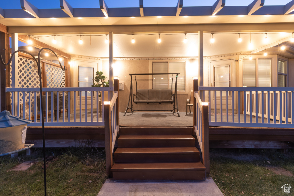 Deck featuring a pergola