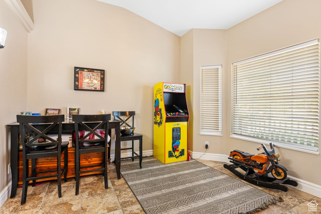 Recreation room with lofted ceiling