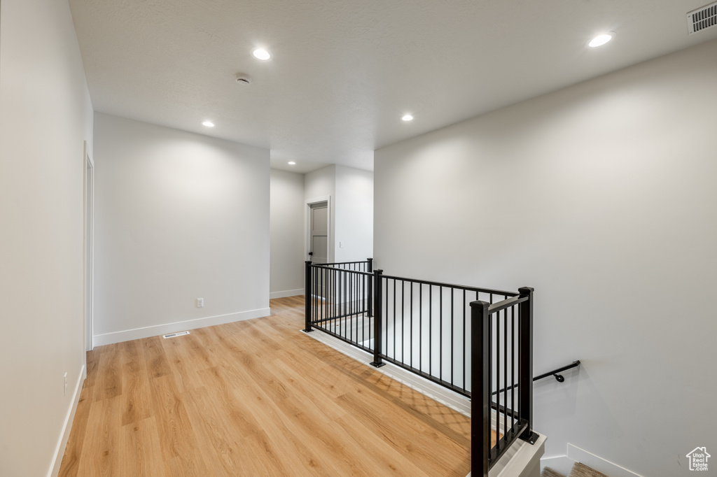 Spare room featuring light hardwood / wood-style floors