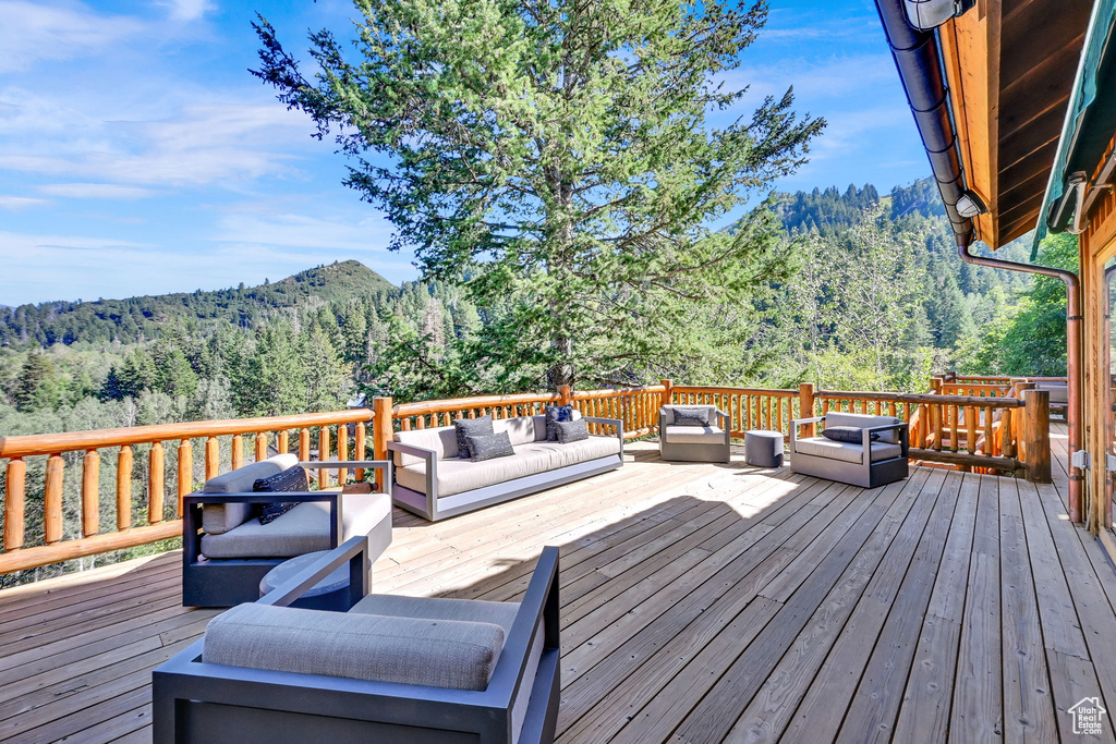 Wooden terrace with an outdoor hangout area