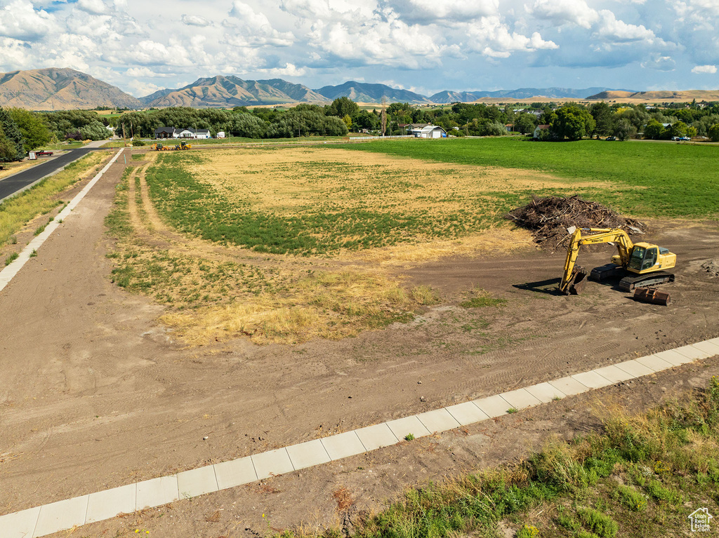 View of home's community featuring a mountain view and a rural view