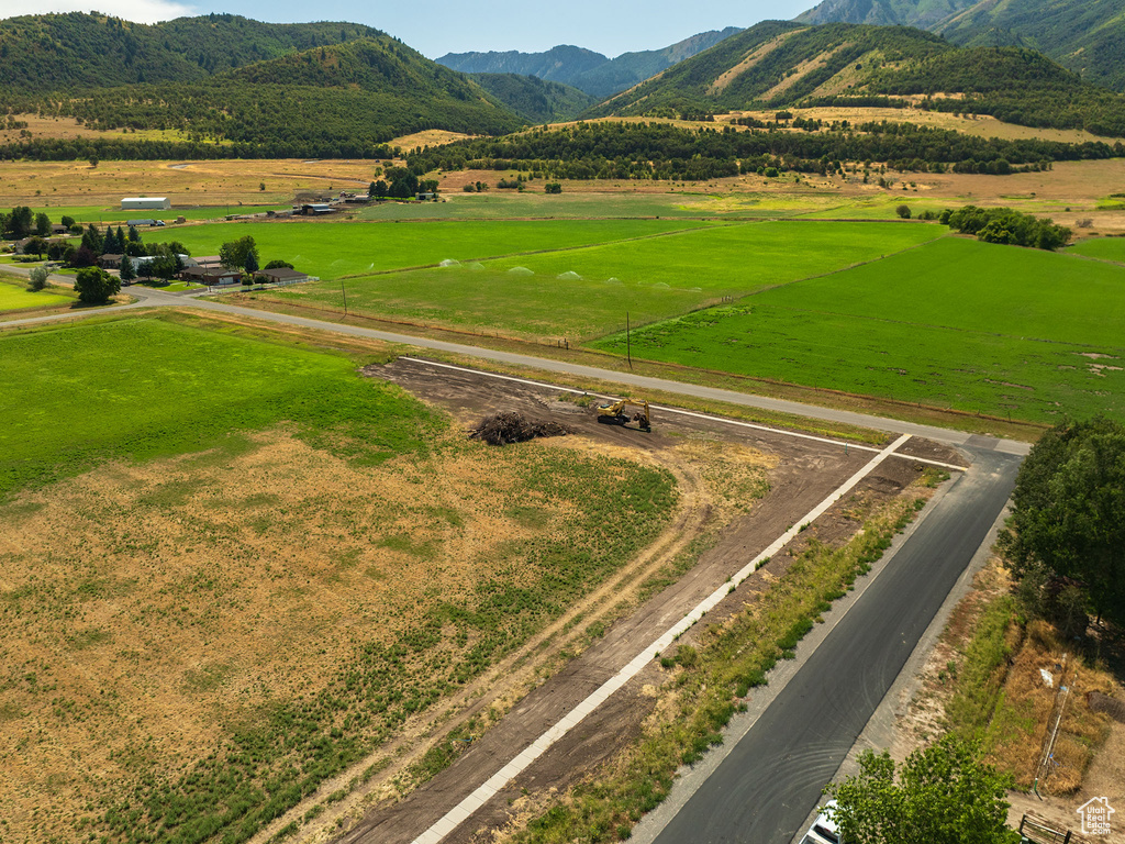 Drone / aerial view featuring a mountain view and a rural view