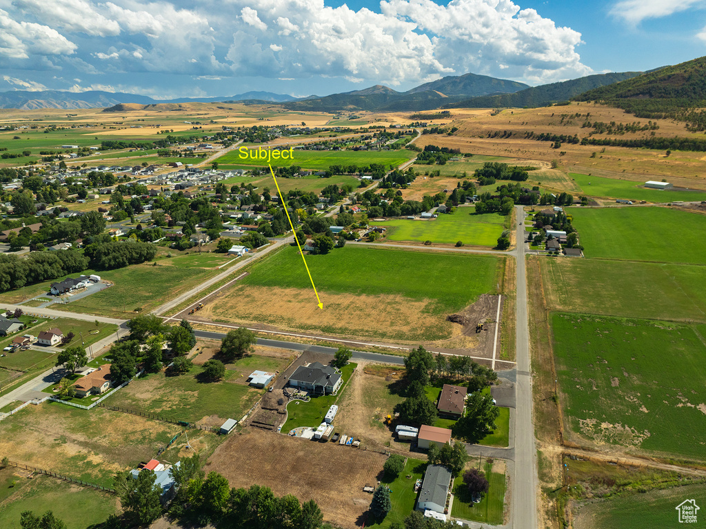 Birds eye view of property featuring a mountain view and a rural view