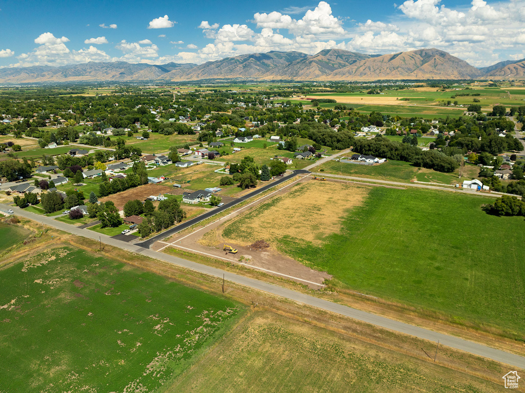 Aerial view featuring a rural view and a mountain view