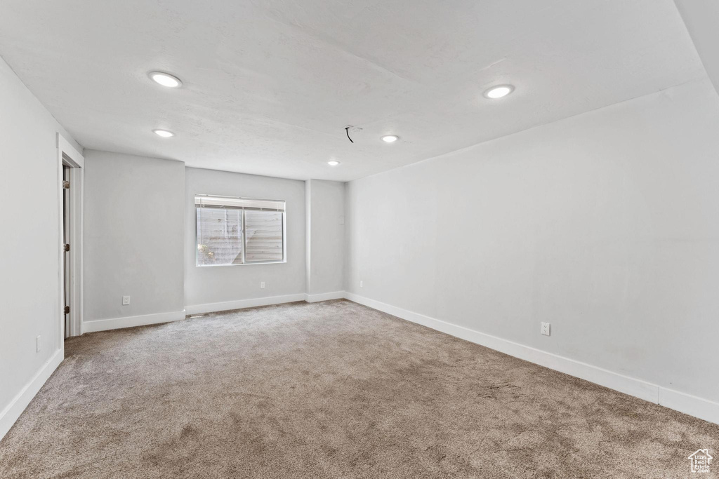 Empty room featuring carpet flooring