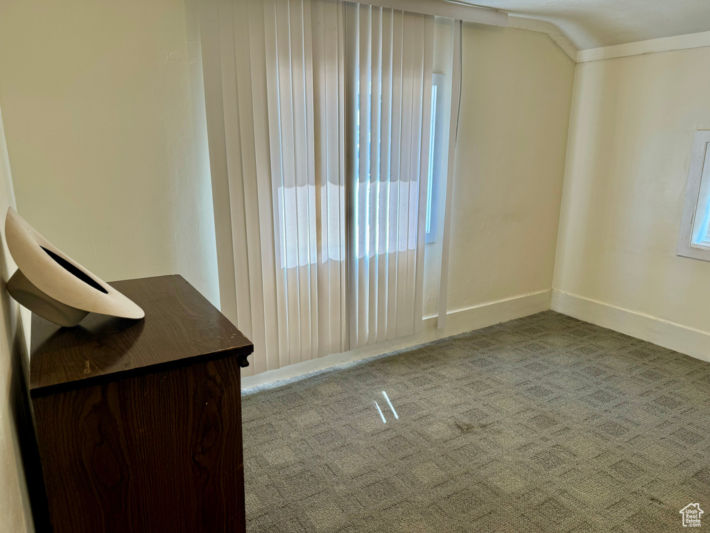 Interior space with vaulted ceiling