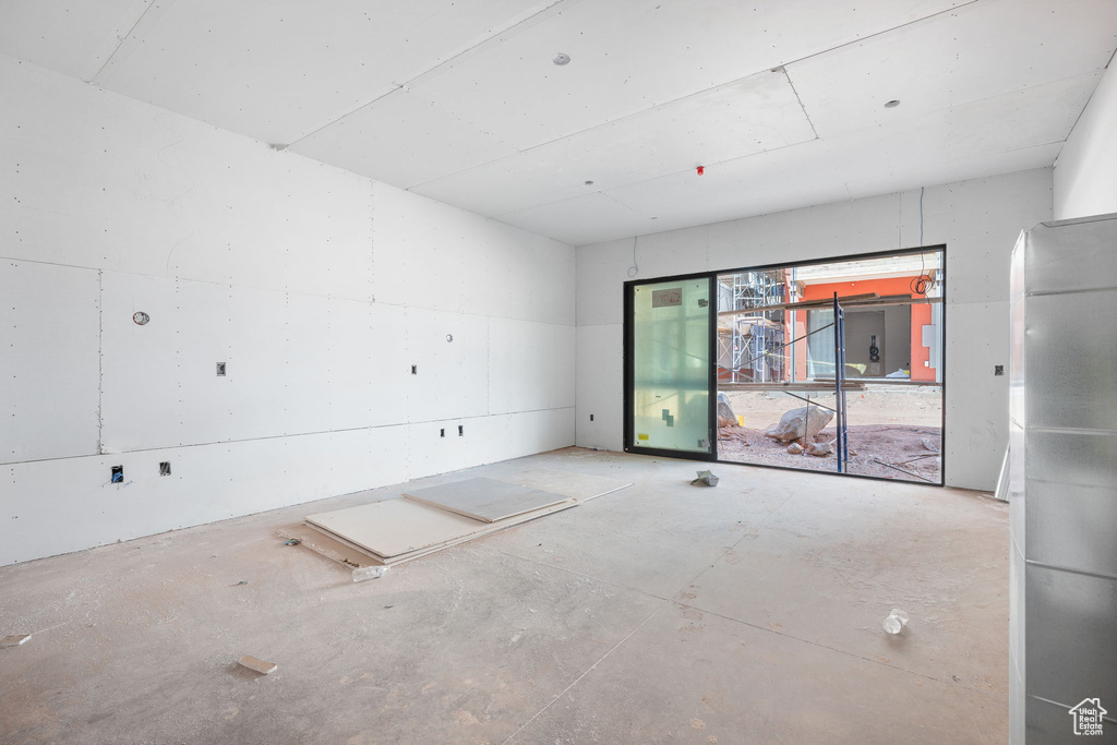 Spare room with concrete floors