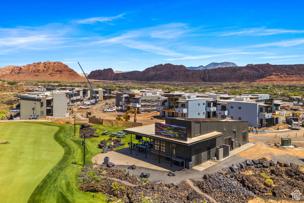 Birds eye view of property featuring a mountain view