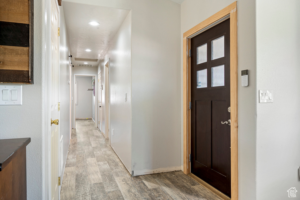 Entryway with wood-type flooring