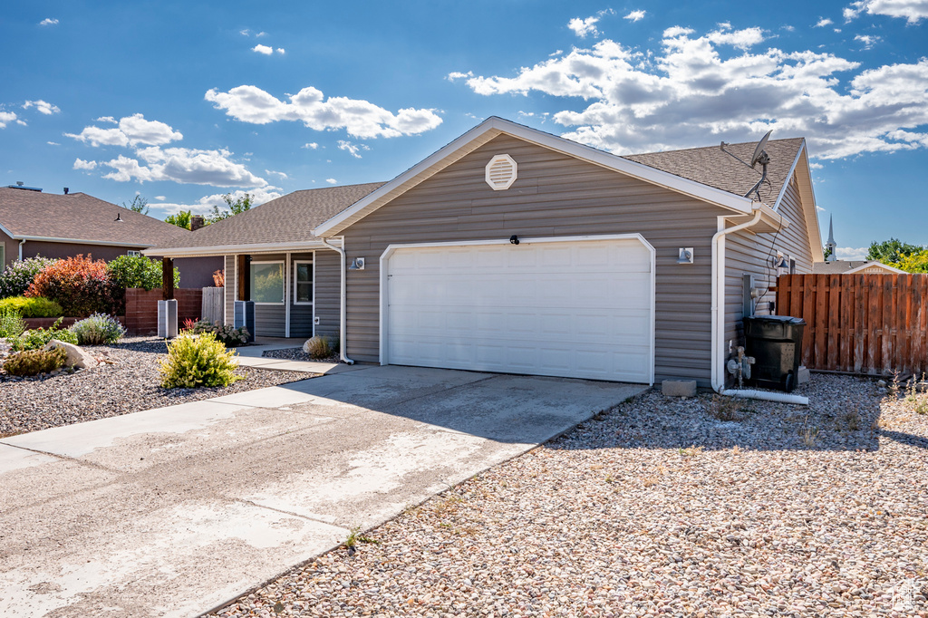 Ranch-style house with a garage