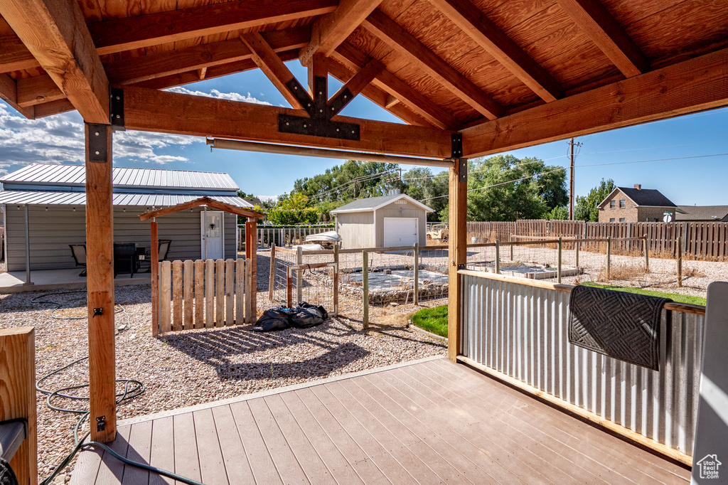 Deck featuring an outdoor structure