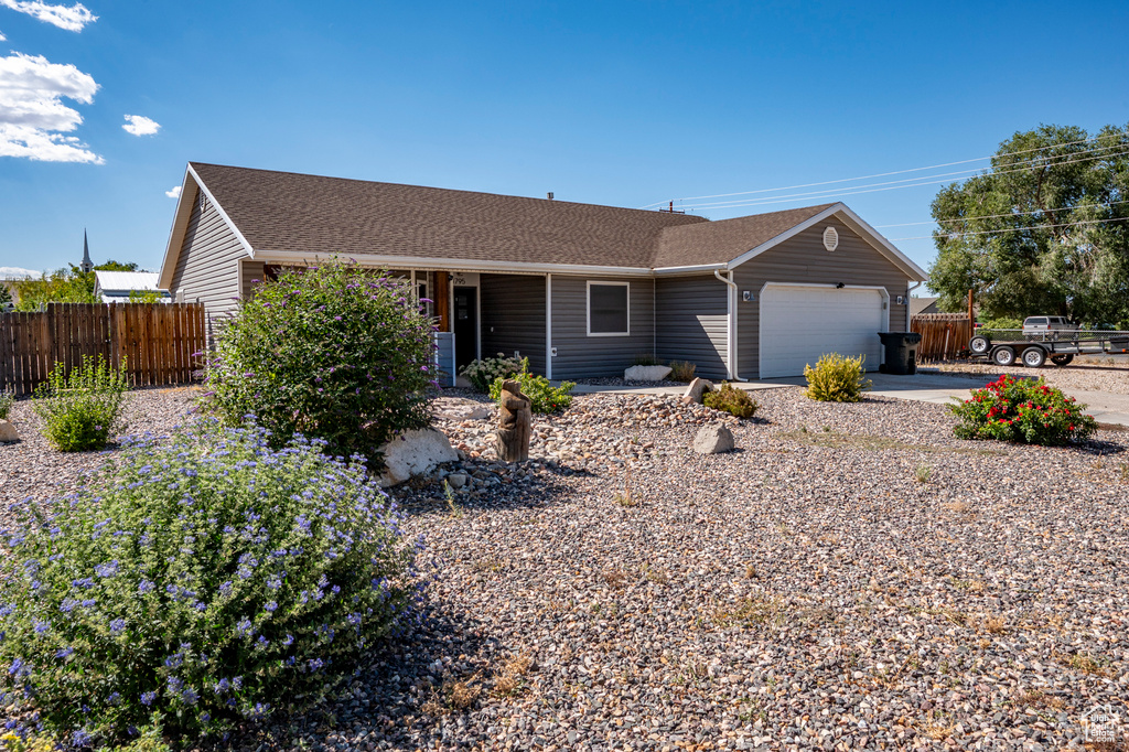 Ranch-style house with a garage