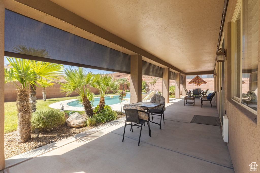 View of patio / terrace featuring a fenced in pool