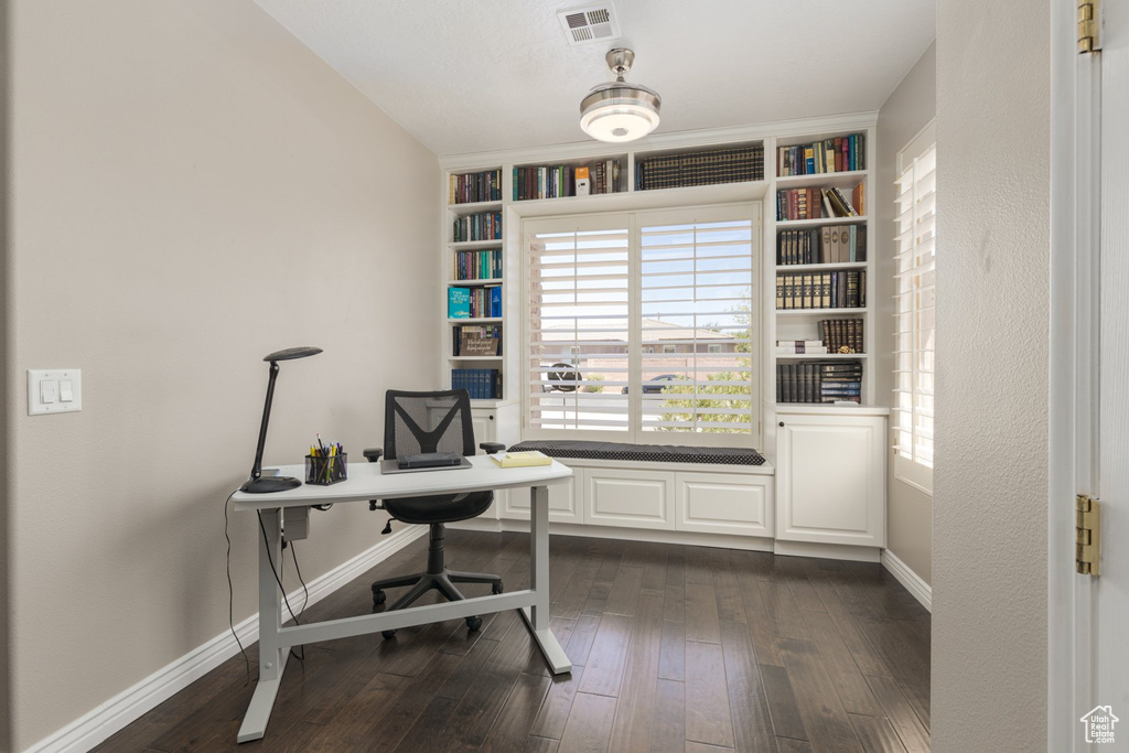 Office space featuring dark hardwood / wood-style floors