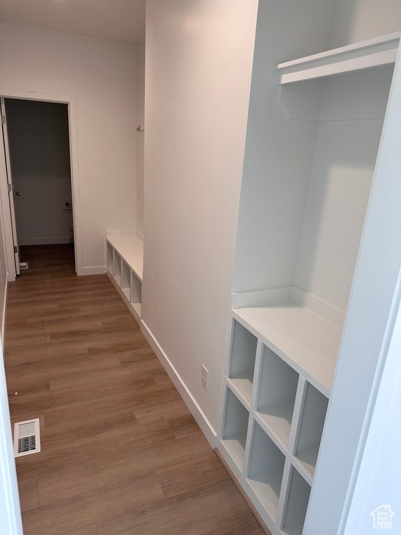 Mudroom with hardwood / wood-style floors