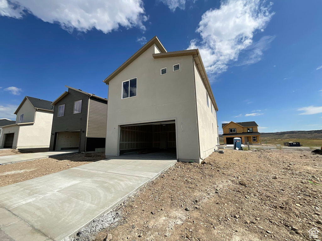 View of home\'s exterior with a garage