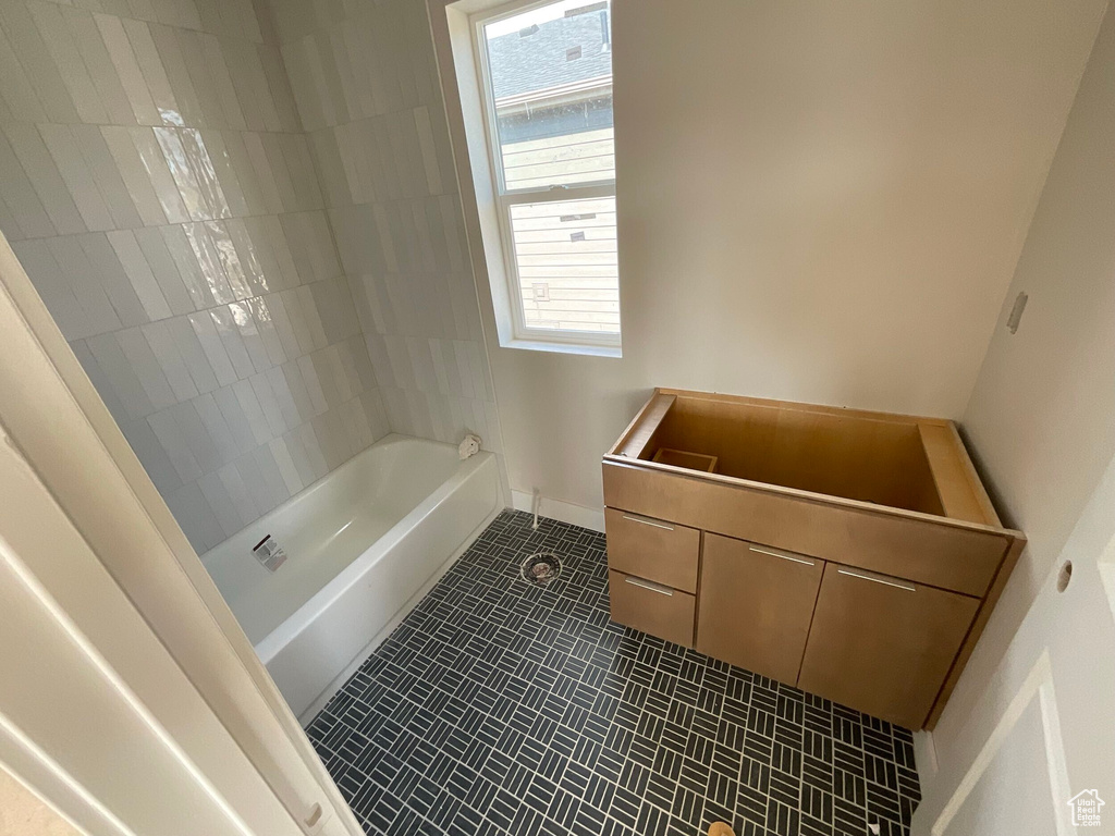 Bathroom featuring vanity and tile patterned floors