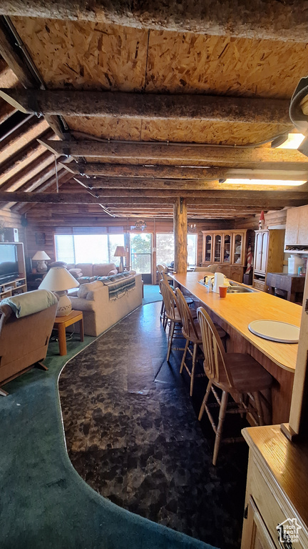 Dining room with a wealth of natural light and vaulted ceiling