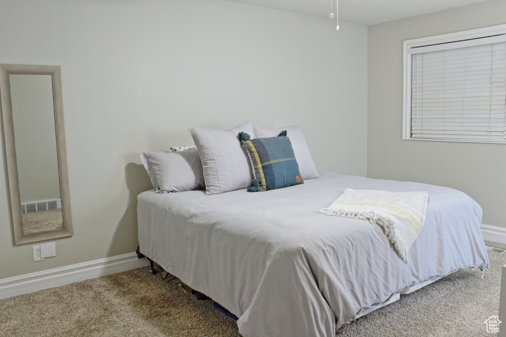 Bedroom featuring carpet