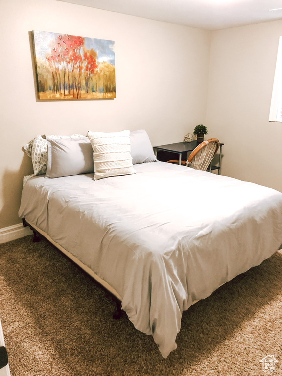 View of carpeted bedroom