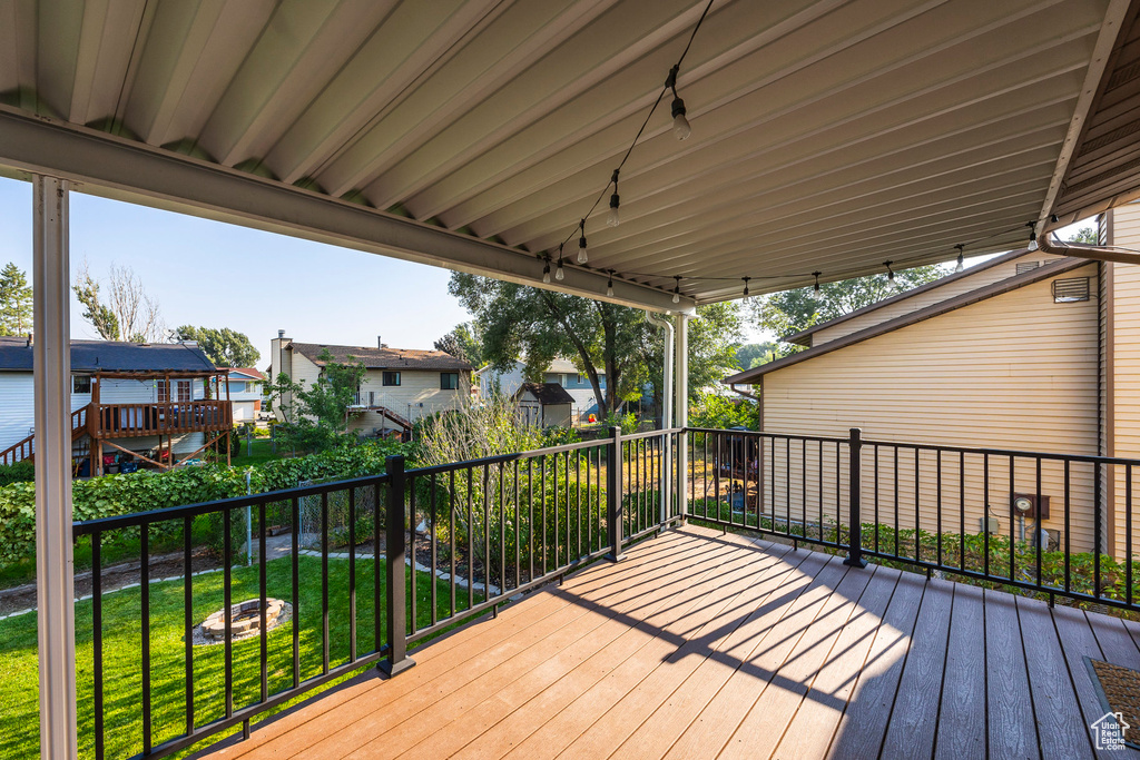 Wooden deck with a yard