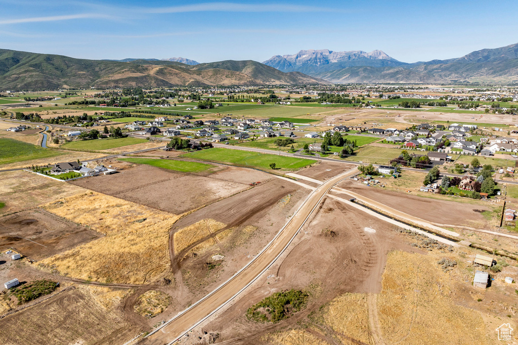 Birds eye view of property featuring a rural view and a mountain view