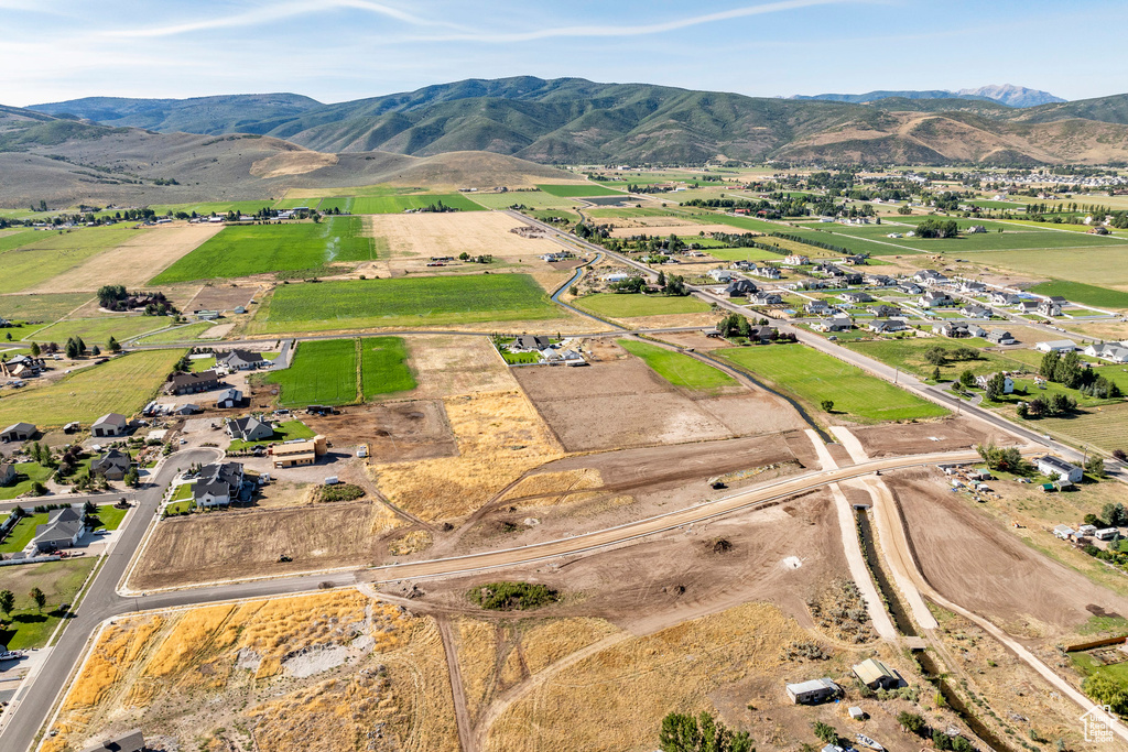 Birds eye view of property featuring a mountain view and a rural view