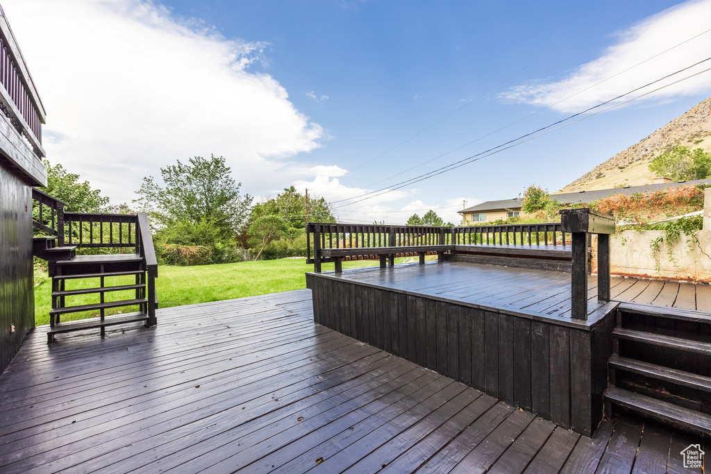 Wooden deck with a yard