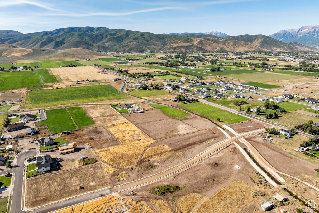 Birds eye view of property with a mountain view