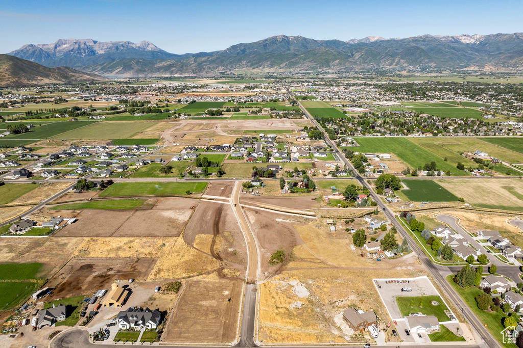 Birds eye view of property with a mountain view