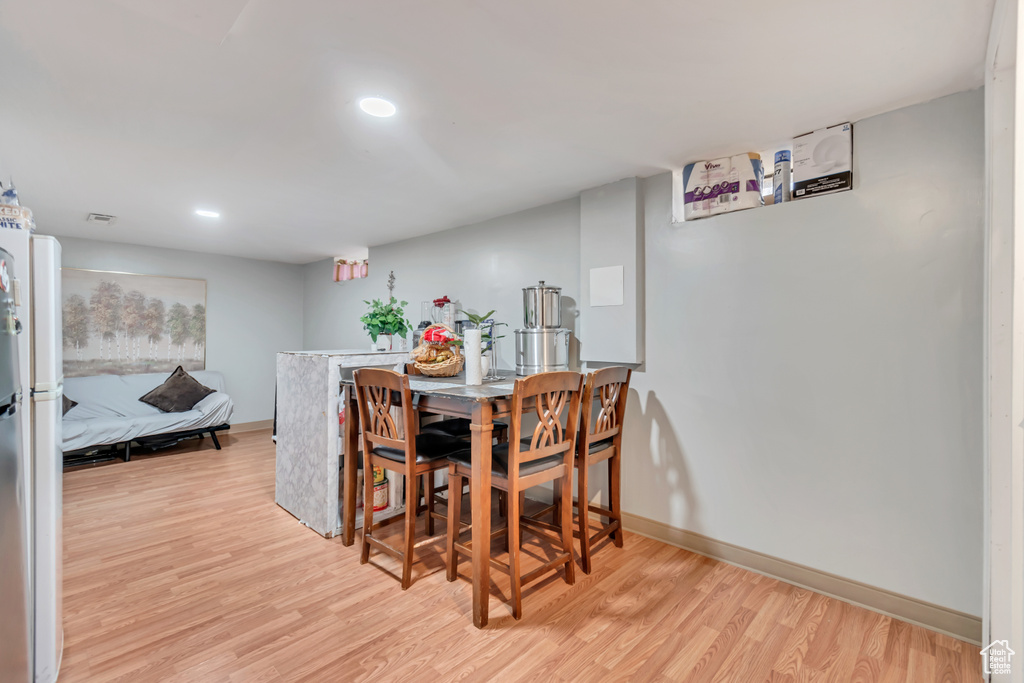 Dining room with light wood-type flooring