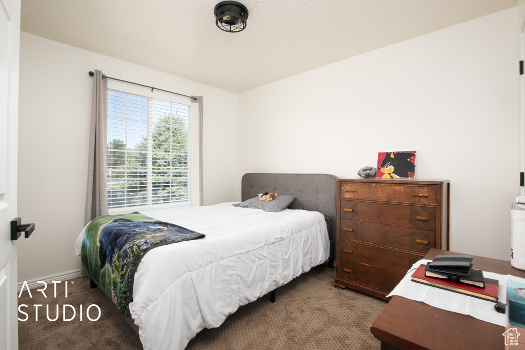 Bedroom with carpet