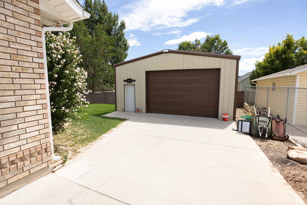 Garage with a lawn