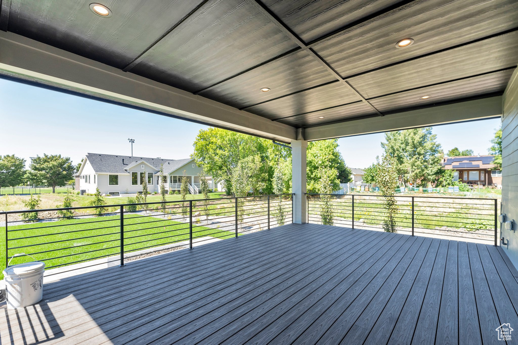 Wooden deck with a yard