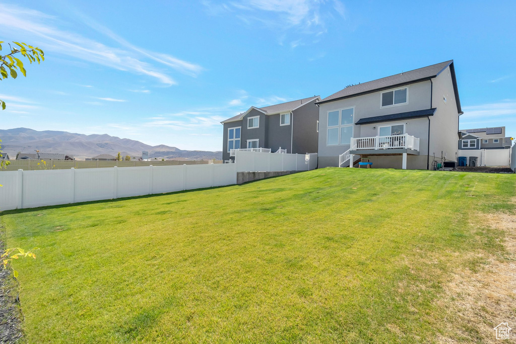 View of yard with a mountain view