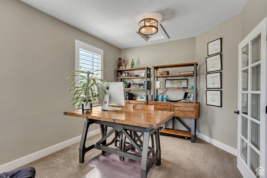 Office area featuring carpet floors