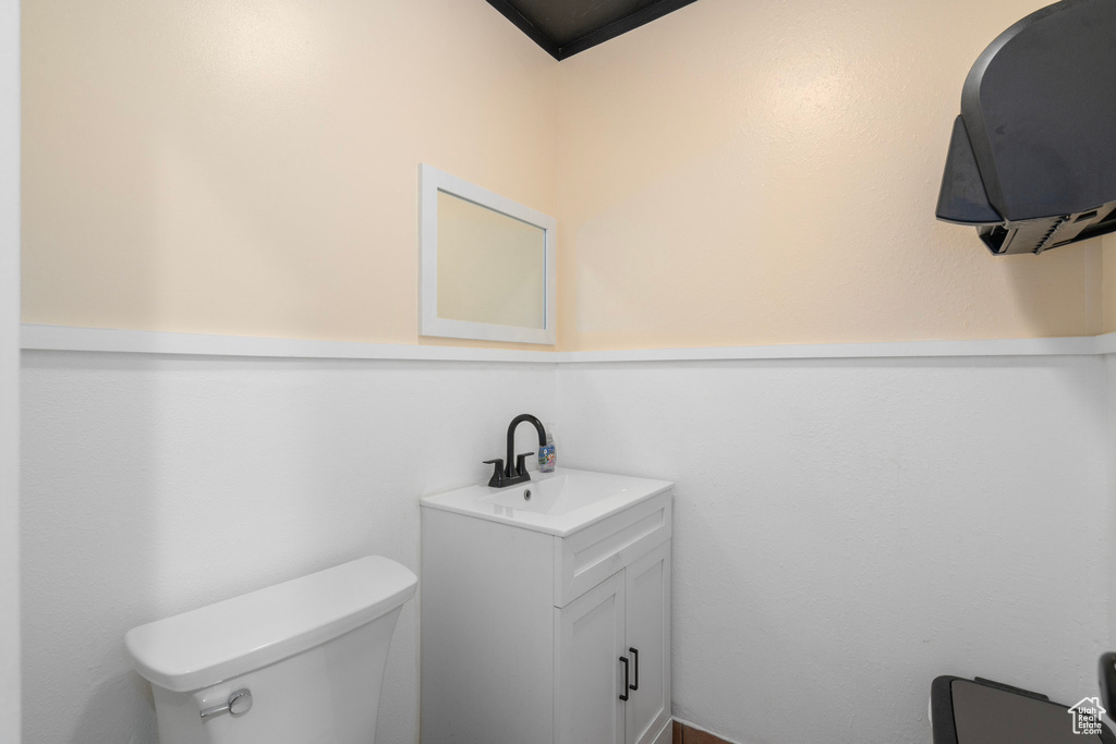 Bathroom featuring toilet and vanity