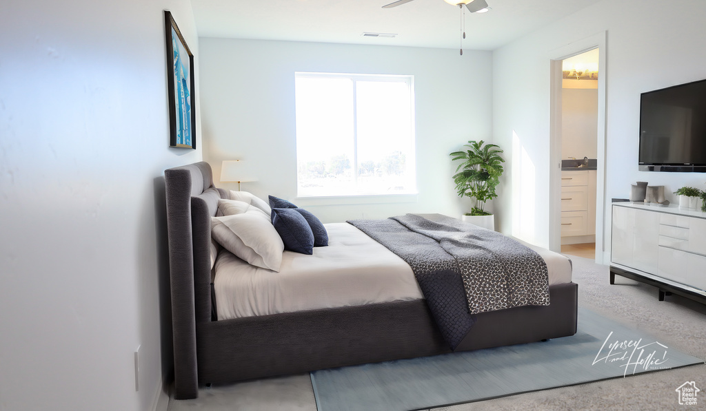 Bedroom with carpet flooring and ceiling fan