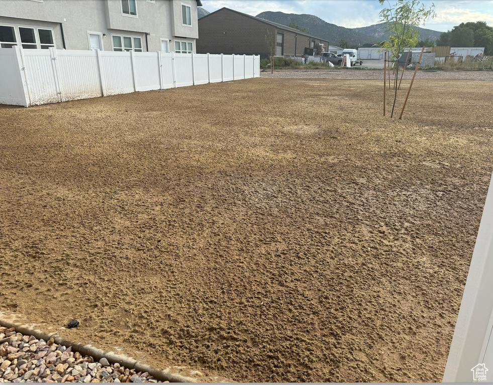 View of yard with a mountain view