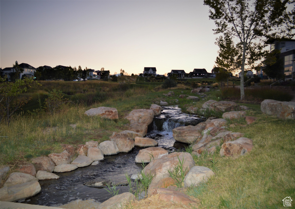 View of yard at dusk