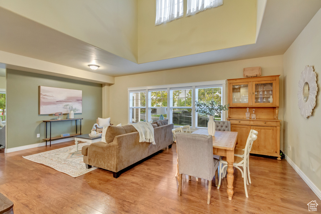 Dining space with light hardwood / wood-style floors