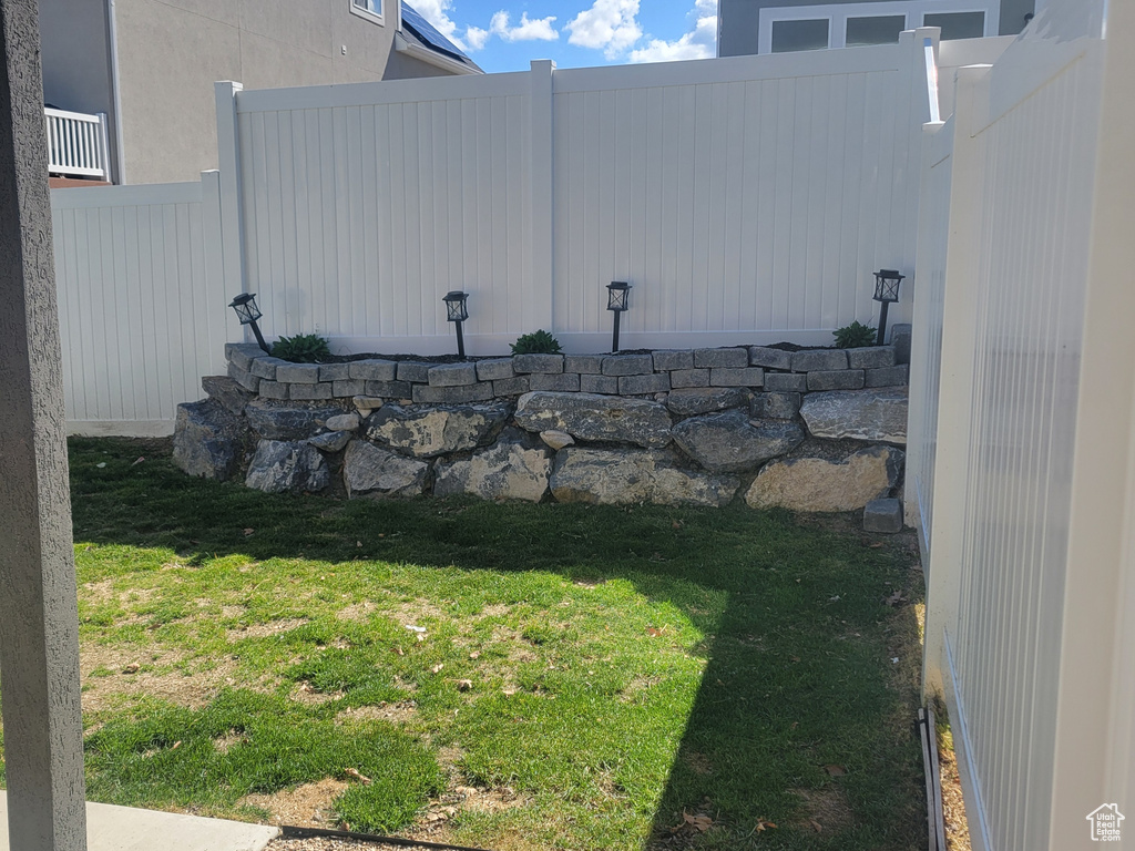View of yard with a fenced backyard