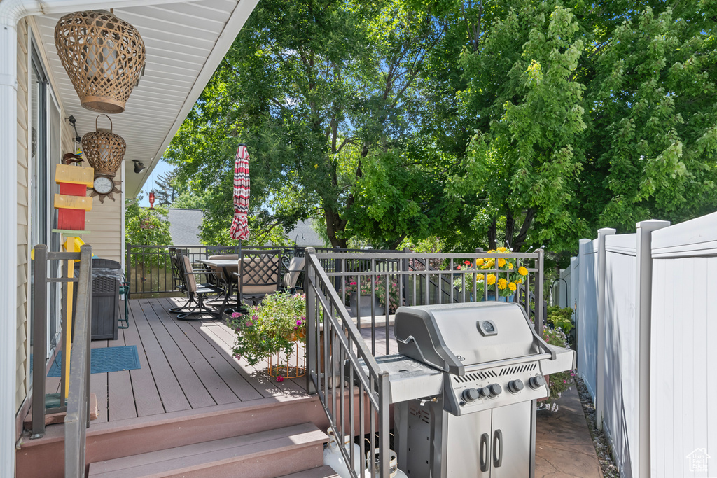 Wooden terrace with a grill