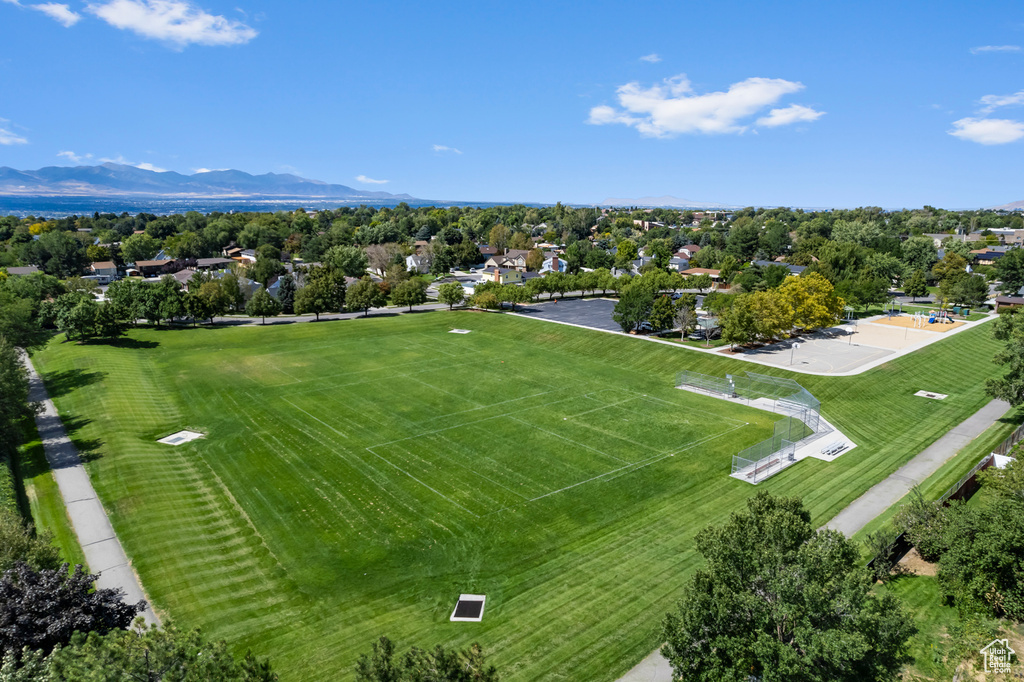 Birds eye view of property with a mountain view