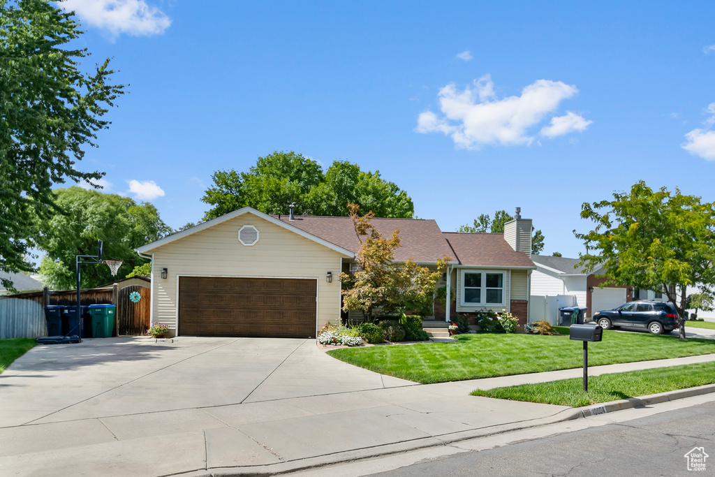 View of front of house with a front lawn