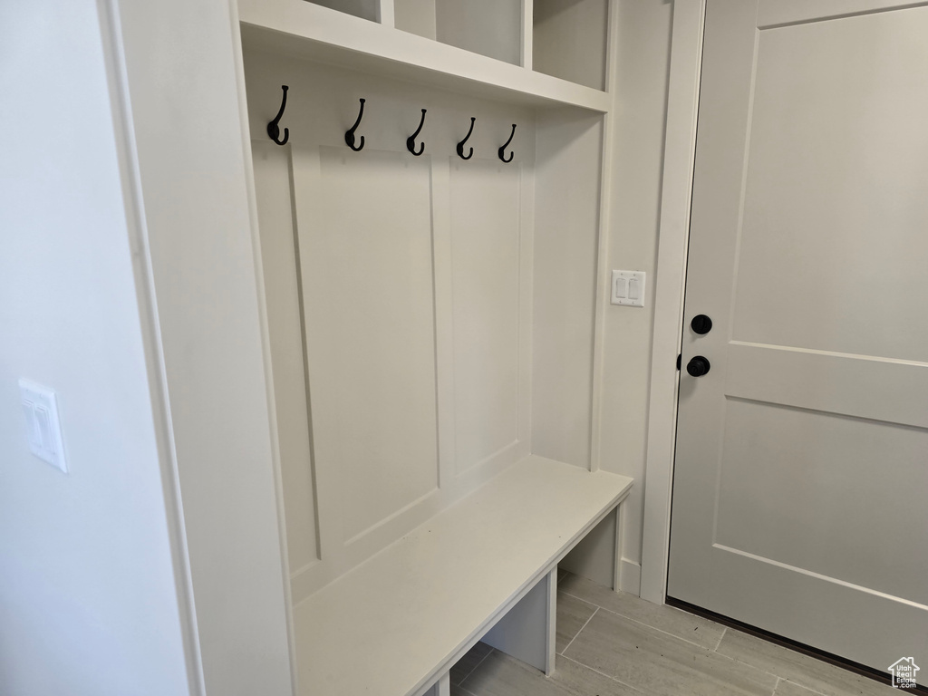 Mudroom with light wood-type flooring